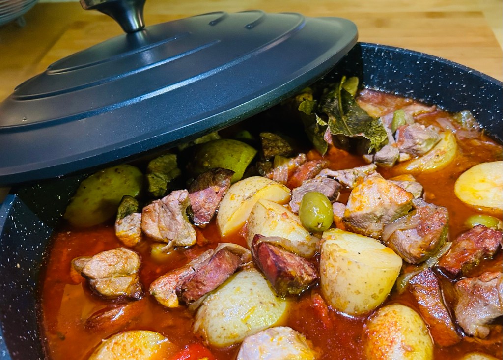 Pork with chorizo, potatoes and olives