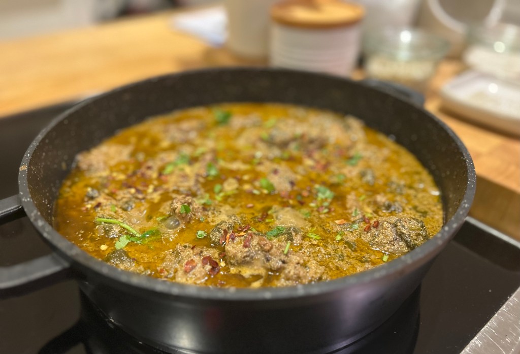 Spiced lamb or beef curry with spinach